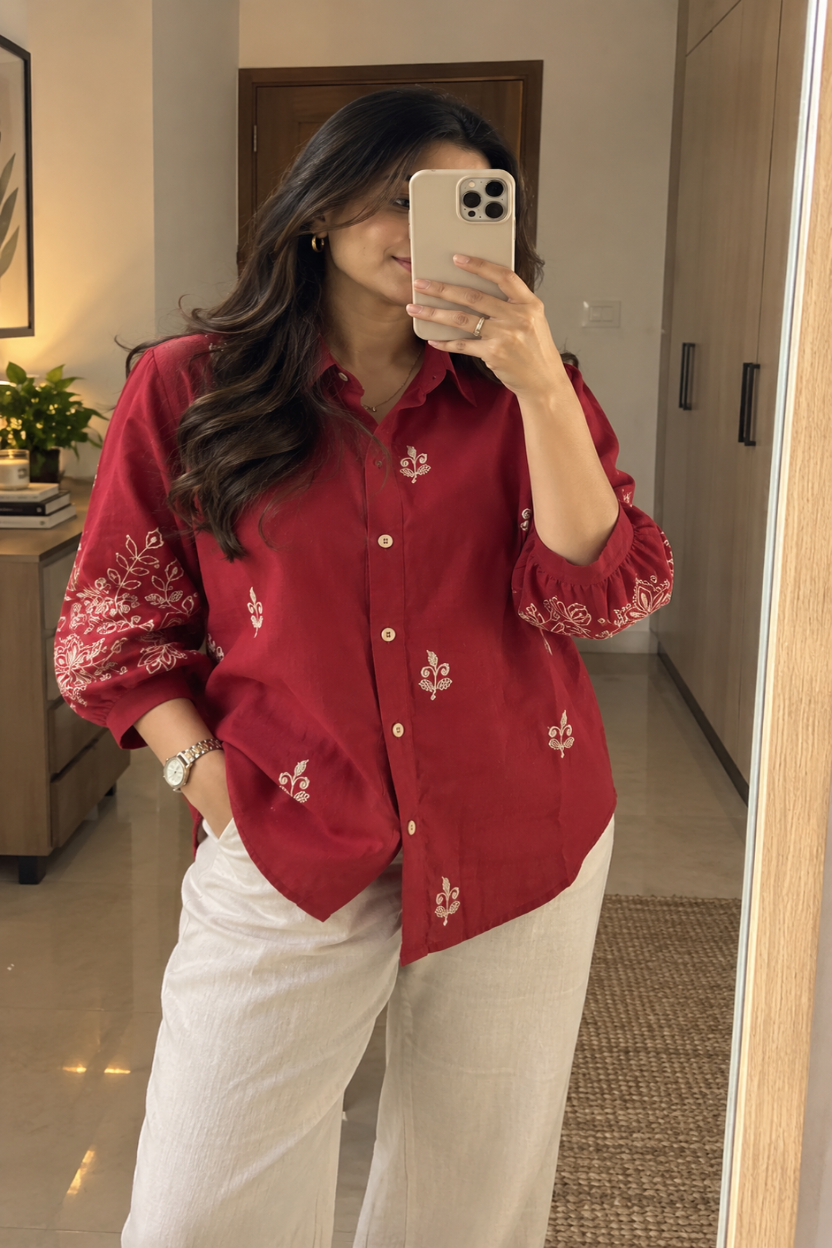 A woman wearing a brown embroidered shirt. Women's shirt. Embroidered Shirt. Ladies Shirt