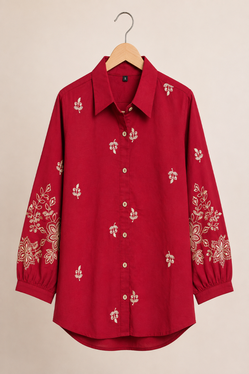 A woman wearing a brown embroidered shirt. Women's shirt. Embroidered Shirt. Ladies Shirt